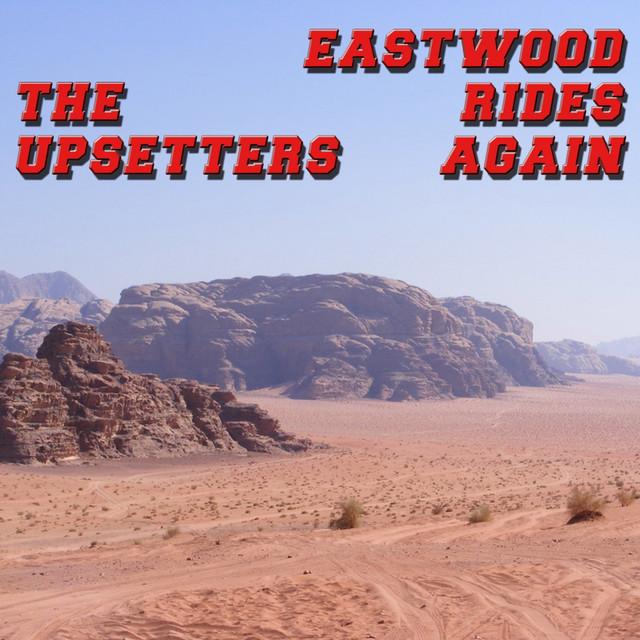 Eastwood Rides Again (Turquiose Vinyl) by The Upsetters album cover